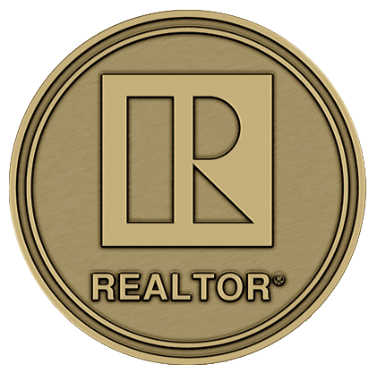 Gold REALTOR logo on a circular background.
