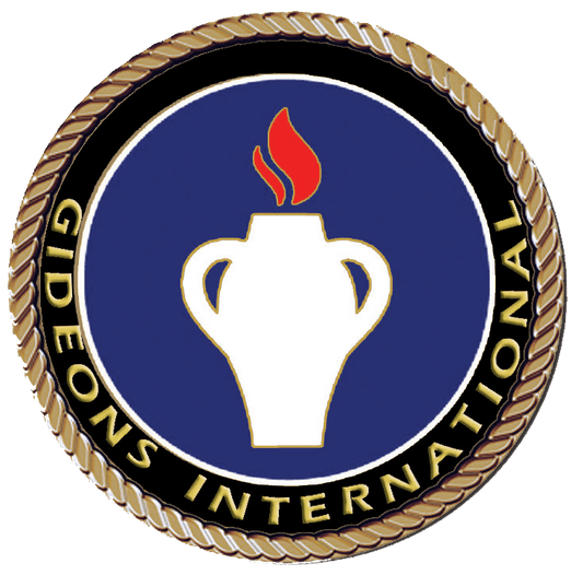 A gold and blue emblem with a white vase on it.